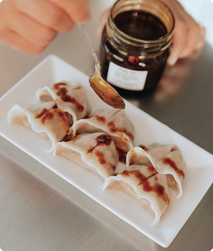 A Maker preparing dumplings at The Hive